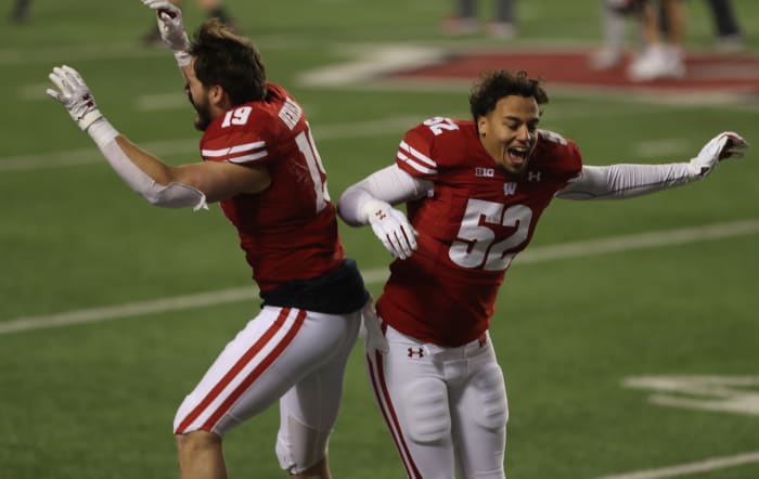 Nick Herbig and Kaden Johnson celebrate a home win.